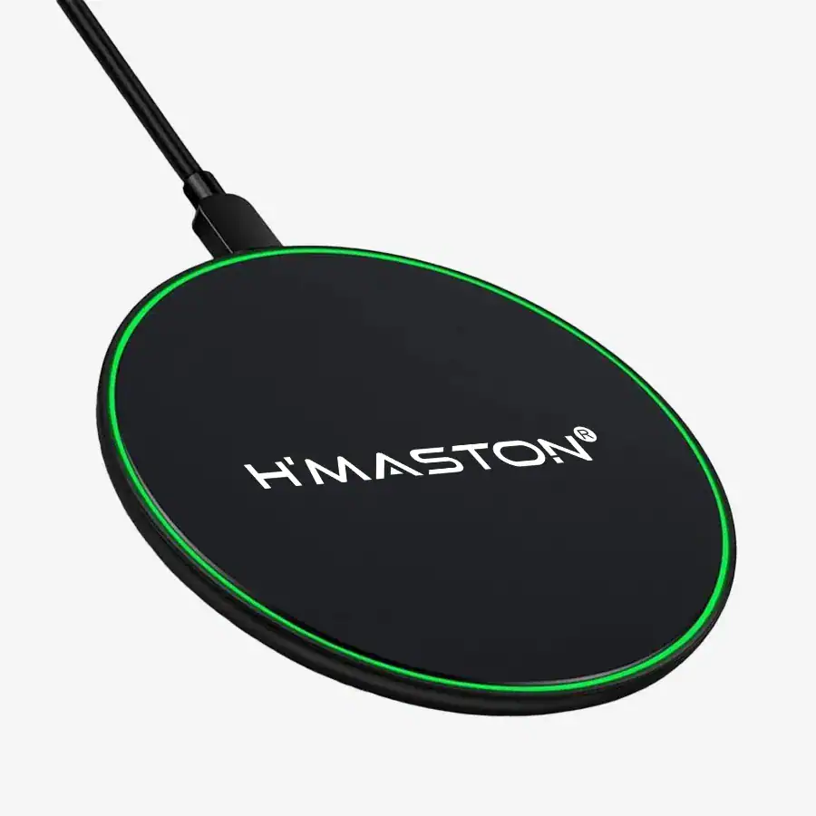Carregador wireless H'MASTON com luz LED verde, compatível com smartphones e dispositivos eletrônicos, fácil de usar e com design moderno para casa ou escritório.
